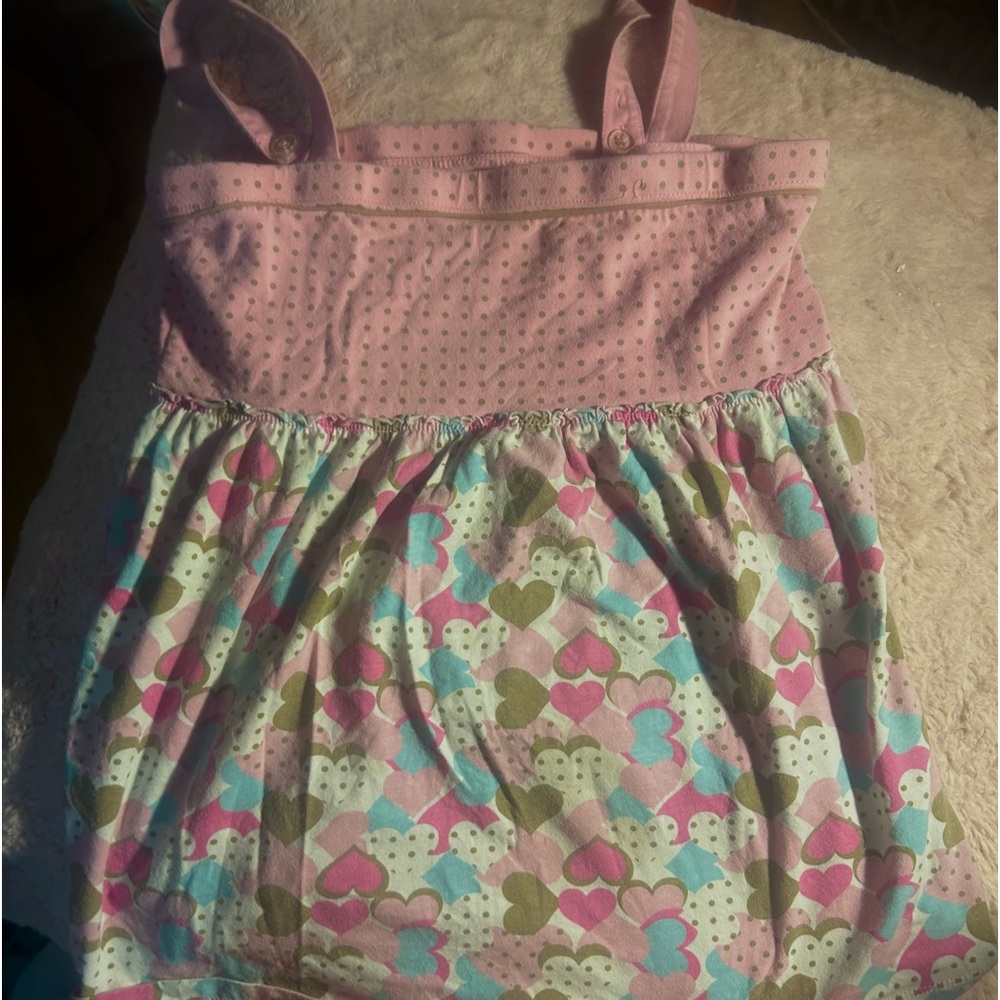 Adorable heart print shirt. Perfect for valentines and hot weather.